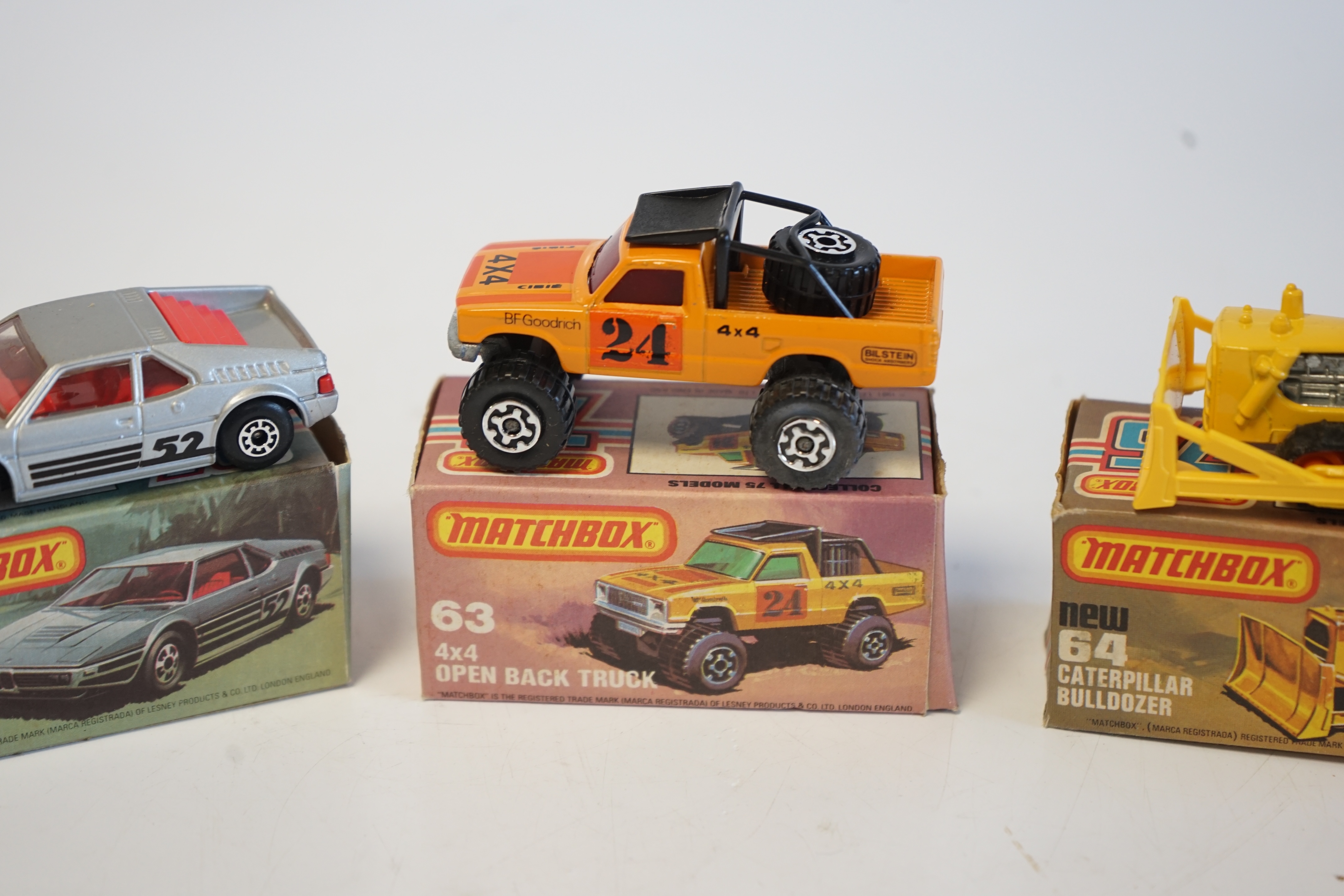 Eighteen boxed Matchbox Series 1-75 diecast vehicles including; 1; Dodge Challenger and another, 9; Ford RS 2000 and another, 10; Plymouth Police Car and another, 14; Petrol Tanker and another, 26; Site Dumper, 28; Formu